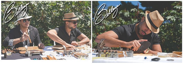 Two cigar rollers rolling cigars